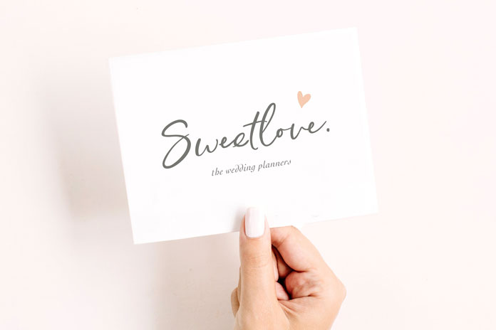 A handwritten script with unique curves and an elegant flow.