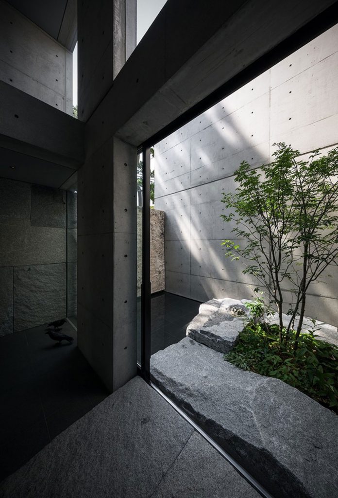 Minimalist stone and concrete residence in Hyōgo, Japan by architecture studio GOSIZE.