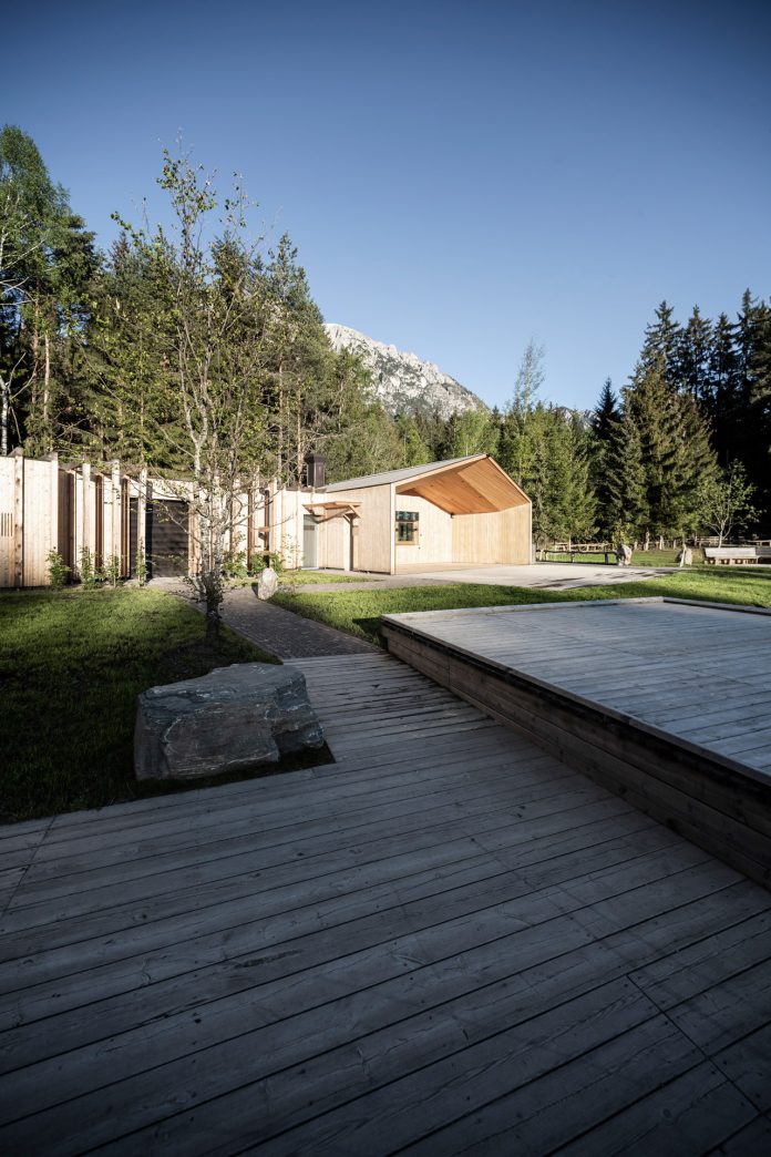 Lake House Völs, a discreet and small lake-hut in the heart of the magnificent mountain landscape of the Sciliar in the South Tyrolean Dolomites in Italy.