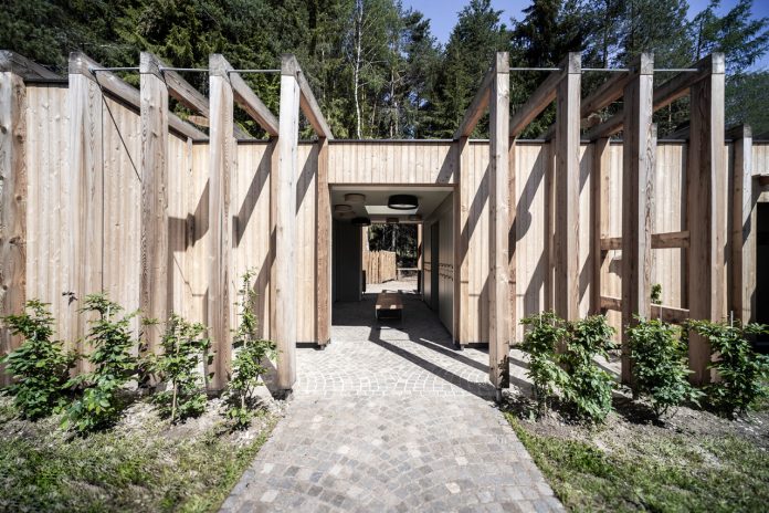 Lake House Völs, a discreet and small lake-hut in the heart of the magnificent mountain landscape of the Sciliar in the South Tyrolean Dolomites in Italy.