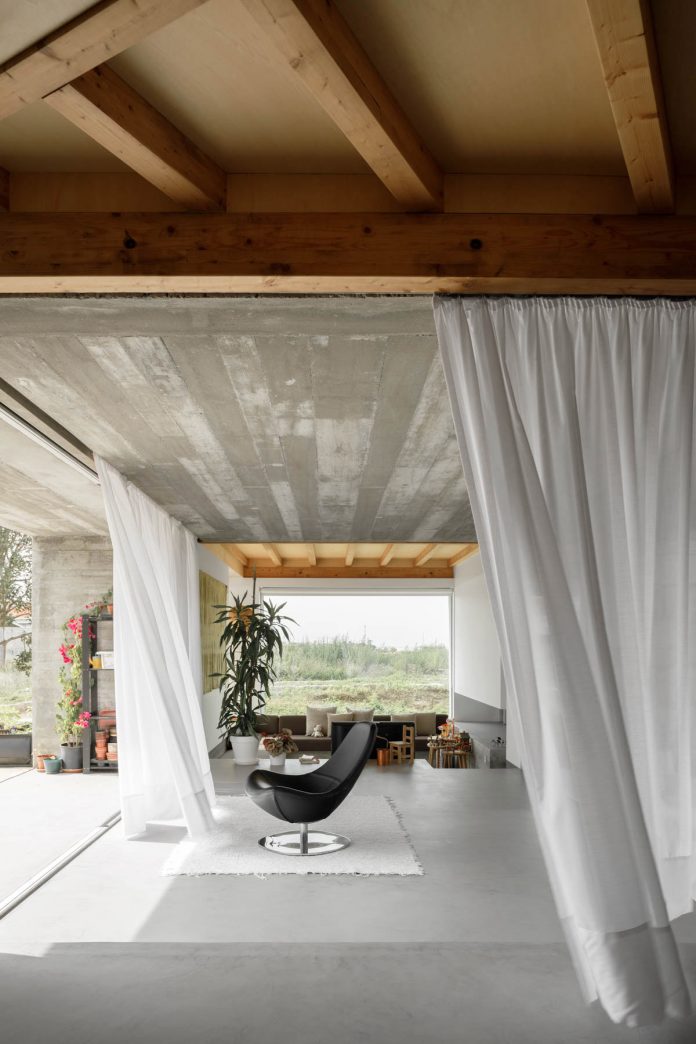 Three old houses converted into one by Paulo Merlini Architects.