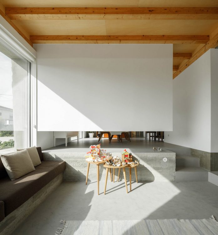 Three old houses converted into one by Paulo Merlini Architects.