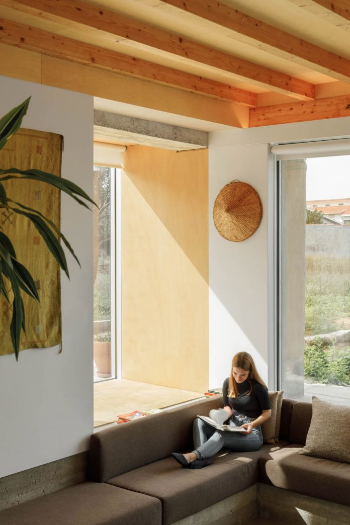 Three old houses converted into one by Paulo Merlini Architects.