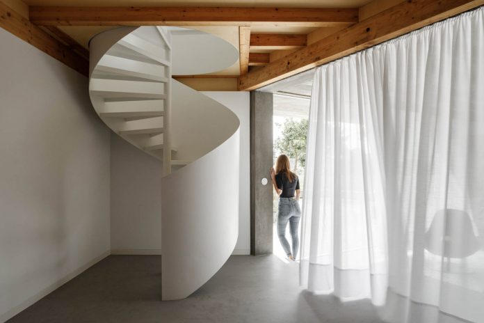 Three old houses converted into one by Paulo Merlini Architects.