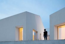Three old houses converted into one by Paulo Merlini Architects.