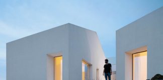 Three old houses converted into one by Paulo Merlini Architects.