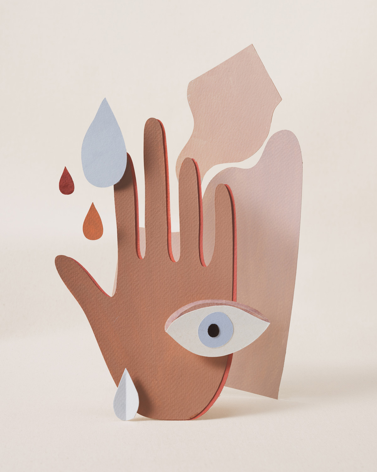 Abstract compositions with cut paper shapes by Adrian Gidi.