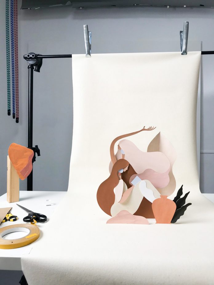 Abstract compositions with cut paper shapes by Adrian Gidi.
