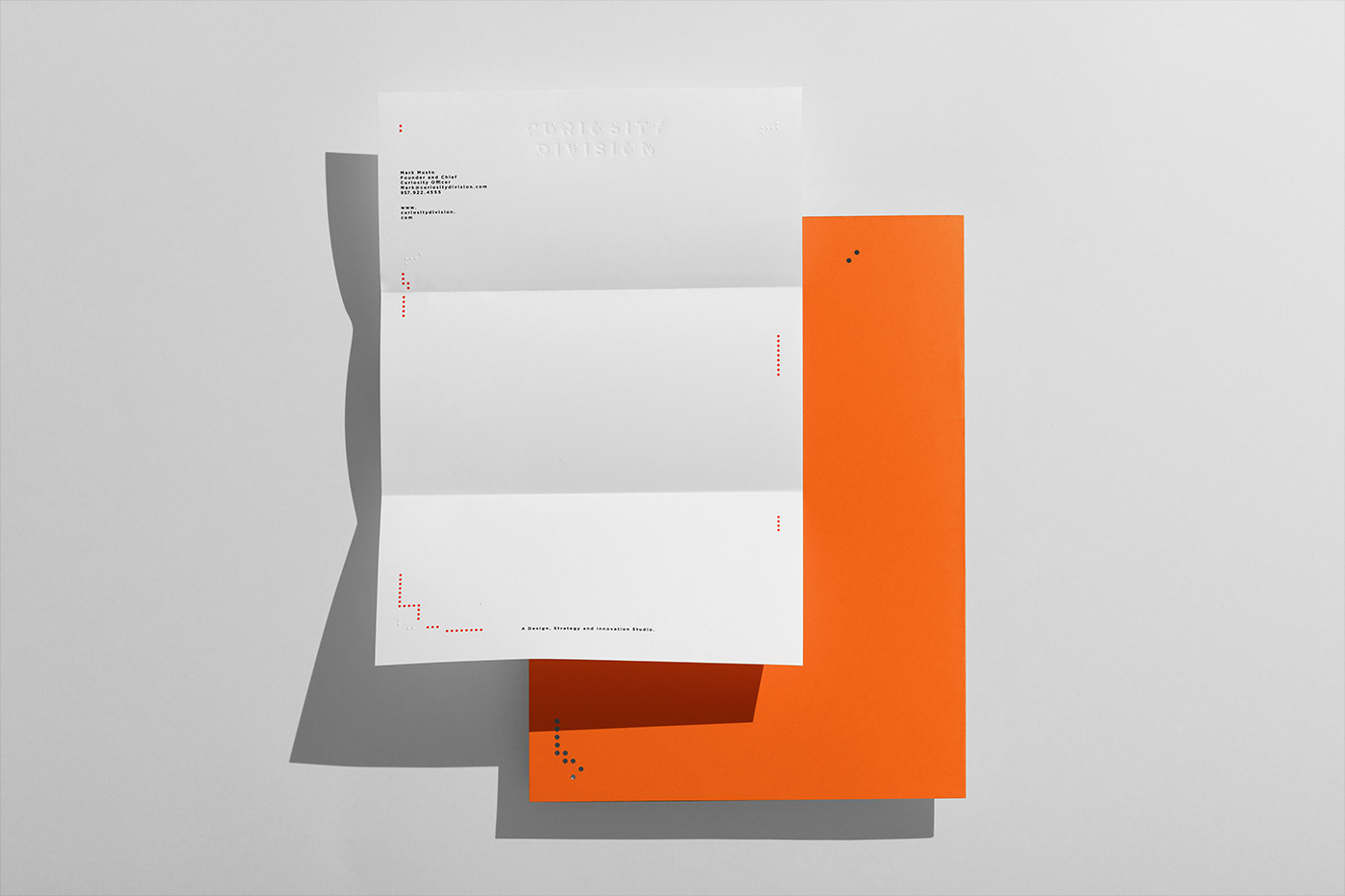 Curiosity Division Brand Identity by Anagrama Studio