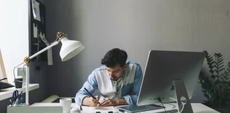 Acquire Clients: Graphic designer working in the office