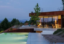 Casa Corten: How Industrial Ruins Became a Modern Sanctuary Casa Corten, a project by HPA Arquitetura e Investimentos, photographed by Ivo Tavares Studio.